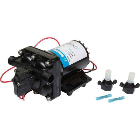 Black pump with connectors and nozzles on a white background